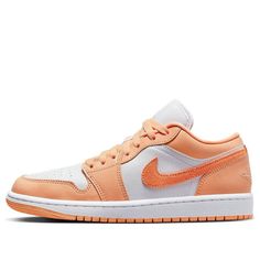 The Air Jordan 1 Low 'Sunset Haze' is a stylish silhouette that features a bright orange and white colorway. Crafted with leather and suede Swooshes, mesh tongues and linings, the sneaker is completed with a two-tone rubber sole. Perfect for any activity, this sneaker draws inspiration from the hazy sunset, making it a must-have for any sneaker enthusiast. With its unique design, the Air Jordan 1 Low 'Sunset Haze' is sure to be a hit. (AJ1/SNKR/Retro/Low Top/Women's/Classic/Non-Slip/Basketball/Wear-resistant) Modern Orange Sneakers With Boost Midsole, Orange Leather Sneakers For Streetwear, Modern Orange Sneakers With Contrast Sole, Orange Cushioned Sneakers For Streetwear, Orange Leather Sneakers With Cushioned Footbed, Modern Orange Low-top Sneakers, Orange Cushioned Sneakers For Spring, Spring Orange Cushioned Sneakers, Hazy Sunset