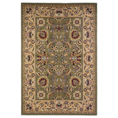 a green rug with an ornate design on the center and sides, in various colors