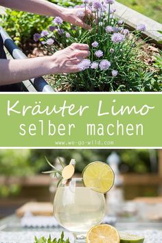 a glass filled with lemonade next to flowers and greenery on top of a table