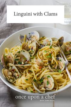 linguini with clams in a white bowl