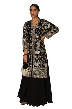 Black long tunic with all over floral gara embroidery. Paired with a skirt. - Aza Fashions Black Semi-stitched Embroidered Fabric, Bohemian Embroidered Dress For Transitional Season, Resham Embroidered Dress For Traditional Ceremonies, Traditional Embroidered Dress For Transitional Season, Black Embroidered Sharara For Transitional Season, Black Straight Kurta Dress With Intricate Embroidery, Black Sharara With Dabka Work, Embroidered Black Sharara For Transitional Seasons, Transitional Black Embroidered Sharara