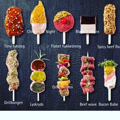 an image of different types of food on skewers