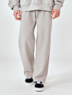 This is a casual and comfortable sweatpants that are made out of high quality cotton and polyester blend fabric. With design detail of regular wide silhouette, soft and sturdy fabric with some elasticity, and adjustable string on the waistband, you can style it for casual and trendy outfit. - Regular wide silhouette- Adjustable string on the waistband- Soft touch of the fabric- Side pockets Gray Wide Leg Sweatpants With Drawstring, Gray Wide-leg Sweatpants With Drawstring, Wide Leg Cotton Sweats For Leisure, Sporty Cotton Sweatpants For Elevated Casual, Leisure Wide Leg Cotton Sweats, Cotton Wide-leg Leisure Sweats, Gray Pants With Elastic Waistband For Leisure, Gray Baggy Sweatpants For Leisure, Relaxed Cotton Sweatpants For Elevated Casual Wear