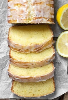 slices of lemon pound cake next to sliced lemons