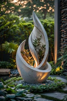 an artistic sculpture in the middle of a garden