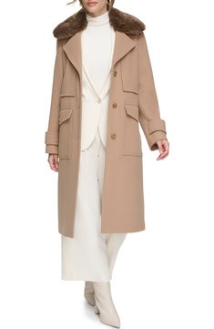 Stay warm in this wool-blend twill coat constructed with a removable faux-fur collar, notched lapels, front button-flap pockets and a back vented hem. 42" length Front button closure Notched lapels Front button-flap pockets Polyurethane backing 53% wool, 38% polyester, 9% other fibers with 100% polyester faux fur Dry clean Imported Model stats: 5'10" height, 32" bust, 25" waist, 36" hip. Model is wearing size Small. Elegant Brown Outerwear With Flap Pockets, Double-breasted Winter Outerwear With Flap Pockets, Elegant Winter Outerwear With Flap Pockets, Winter Office Outerwear With Flap Pockets, Beige Wool Collared Outerwear, Beige Outerwear With Faux Fur Trim For Work, Fall Wool Coat With Faux Fur Trim For Work, Fall Workwear Wool Coat With Faux Fur Trim, Double-breasted Faux Fur Trim Workwear Outerwear