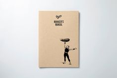 a book with an image of a man holding a frisbee on his head