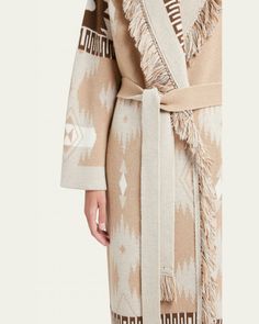 Alanui "Icon" patterned jacquard coat with fringe trim    Shawl collar    Long sleeves    Side slip pockets    Selftie belt    Relaxed fit    Wool    Made in Italy Alanui Cardigan, Fringed Belt, Ethnic Design, Knitwear Design, Cashmere Cardigan, Shawl Collar, Grey Fashion, Kimonos, Wool Coat