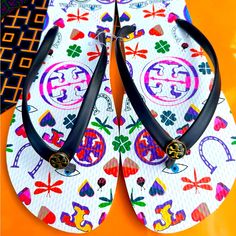 Brand New In Box 100% Authentic Tory Burch Pvc/Rubber Sole Flip Flop Sandals Tory Navy Lucky Charm Multicolor Gold Logo Sz 10 Tory Burch Flip-Flop So Lightweight And Comfortable You'll Want To Wear Them Every Day Imported: Made In China Please Note Dust Bag Is Not Included. 100% Authenticity Guaranteed. Buy With Confidence. We Have Original Store Receipt For Every Item We Sell Due To Authenticity And Tax Purposes. Please Feel Free To Email Any Questions Or Concerns Before You Buy. Thanks Casual Tan Flat Flip Flops, Flat Flip Flops With Branded Insole For Vacation, Casual Tan Flip Flops For Spring, Tan Flip Flops For Summer, Tan Round Toe Flip Flops For Summer, Casual Tan Synthetic Sandals, Casual Tan Flip Flops For The Beach, Tan Vacation Flip Flops, Tan Flat Flip Flops For Vacation