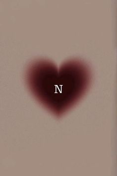 a heart shaped object with the letter n in it