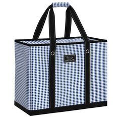 a blue and white tote bag with black straps on the front, in gingham fabric