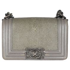 Listing Title: Chanel Grey Lambskin Galuchat Stingray Small Boy Bag SKU: 132584 Condition: Pre-owned Handbag Condition: Fair Condition Comments: Item is in fair condition with prominent signs of wear. Scuffing throughout exterior and interior leather. Scratching along hardware. Please note: this item can not be shipped to all areas. Brand: Chanel Model: Boy Bag Origin Country: France Handbag Silhouette: Crossbody Bag;Shoulder Bag Occasions: Evening;Everyday Size (Generic): Small Size (Specific): Gray Handbags, Grey Exterior, Small Boy, Chanel Model, Accessories Box, Stingray, Fendi Bags, Burberry Bag, Bag Shoulder