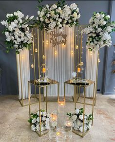 two tables with flowers and candles on them