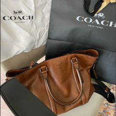 Beautiful Coach Metro Tote (Not From Outlet) Purchased Less Than Two Years Ago. Working From Home Now, Do Not Need It. Strong Strap For Shoulder Or Cross Body Wear. A Great Bag! Coach Tote Shoulder Bag With Adjustable Strap, Coach Shoulder Tote Bag With Detachable Handle, Coach Shoulder Tote Bag With Metal Hardware, Brown Coach Bag With Turn-lock Closure, Coach Tote Bag With Gold-tone Hardware, Coach New York, Bags Coach, Laptop Bags, Coach Bags