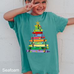 Christmas Teacher Shirt,Christmas Gift For Teacher Shirt, Teacher Tree Shirt,School Team Christmas Shirt,Kids School Christmas Shirt,401 COMFORT COLORS - ADULT UNISEX - SHORT SLEEVE T-SHIRT - 1717 6.1 oz./yd² (US), 10 oz/L yd (CA), 100% ring-spun cotton, 30 singles Garment dyed for that lived in feel and almost no shrinkage at home. Soft ring-spun cotton fabric with 100% cotton threads Relaxed fit Topstitched, classic width, rib collar Shoulder to shoulder twill tape Signature twill label Made W Teacher Tree, Christmas Gift For Teacher, School Team, Tree Shirt, Teacher Christmas Gifts, Teacher Christmas, Gift For Teacher, Soft Ring, Unisex Shorts