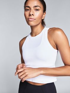 We work hard to ensure our range makes as little impact on the environment as possible; that’s why our motto is Less But Better. The Power Crop Tank is made from our Good Time Seamless fabric, which uses yarns that break down into organic matter within five years of being sent to landfill. Even the branding is eco-cons Functional White Everyday Activewear, High Stretch White Cotton Activewear, White High Stretch Cotton Activewear, White Moisture-wicking Activewear, White Activewear With Light Support, Versatile White Activewear For Everyday, Functional White Tops For Everyday, Less But Better, Sweaty Workouts