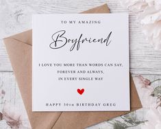 a birthday card with the words boyfriend on it and a red heart in the middle