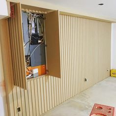 an electrical box in the middle of a room that is being built into the wall