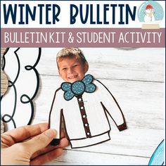 a hand holding up a cutout of a child's jacket with the words winter bulletin