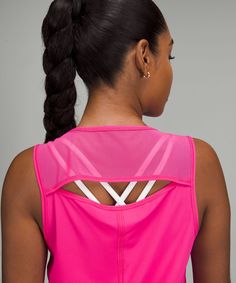 Sprints anyone This lightweight tank has mesh fabric panels for breathability in sweaty situations. Designed for On the Move. An easy fit that floats away from your body:Sits below the waistband for moderate, everyday coverage. Reflective details.