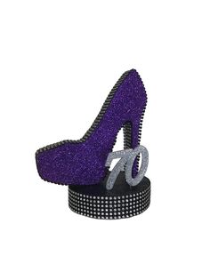 "A Glittered Stiletto High Heel Shoe made from EPS foam. The centerpiece includes a 6\" glittered base. Both are trimmed in Rhinestone Ribbon. Order glittered numbers from 1-100 to add to the base. Use to celebrate birthdays, sweet 16, anniversaries, and any special occasion." Star Centerpieces, Rhinestone Ribbon, Black Shoe, Stand Light, Loose Glitter, Stiletto Shoes, Light Pink Color, Decor Black, Blue Square