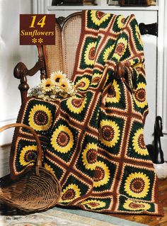 a crocheted blanket sitting on top of a chair