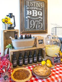 a table topped with pies and bottles of beer