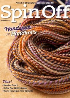 the front cover of spin off magazine, featuring yarn and knitting needles on a wooden surface