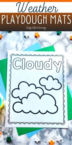 a weather playdough mat with clouds on it