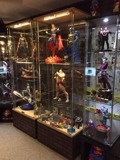 a display case filled with lots of action figures