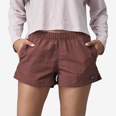 The Barely Baggies™ Shorts have a lower rise and a shorter inseam than our classic Baggies, with side slits at the hem for comfort. They're built of 100% recycled nylon faille with a durable water repellent (DWR) finish made without perfluorinated chemicals (PFCs/PFAS). Inseam length is 2½, and there's a P-6 logo at the left hem. | Patagonia Women's Barely Baggies™ Shorts - 2½" Inseam in Dulse Mauve, Large - Casual Shorts - Recycled Nylon/Recycled Polyester Patagonia Nylon Casual Shorts, Patagonia Casual Nylon Shorts, Patagonia Sporty Relaxed Fit Bottoms, Travel Shorts With Elastic Waistband, Patagonia Casual Cotton Bottoms, Patagonia Cotton Shorts With Pockets, Casual Patagonia Shorts With Pockets, Patagonia Casual Shorts With Pockets, Casual Patagonia Bottoms