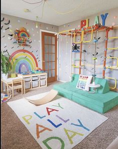 a child's room decorated in rainbow colors