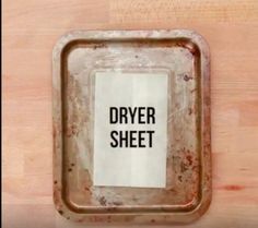 a metal tray with a sign that says dryer sheet