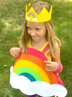 Somewhere over the 🌈 RAINBOW 🌈... Let Superkid Capes help you capture some magical moments with your little hero outfitted in our bright and colorful rainbow costume! Whether its for that special Halloween costume, a parade, a school play, a magical birthday party, or just for fun; our rainbow costume will definitely brighten everyone's day. WHAT YOU GET: 1 one-of-a-kind, easy on, handmade 🌈 RAINBOW COSTUME 🌈, with option to add matching hair bow, headband and rainbow arm bands. Rainbow crow Rainbow Costume, Spring Costume, Rainbow Costumes, Handmade Halloween Costumes, Halloween Kids Costumes Girls, Kids Halloween Costumes, Kids Costumes Girls, Magical Birthday, Crown Crafts