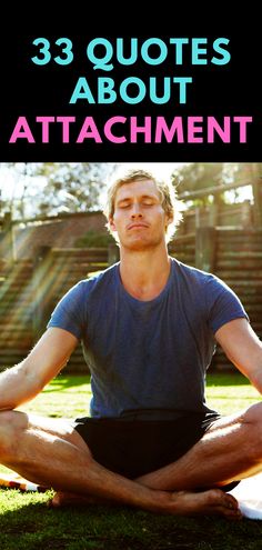 a man is sitting in the grass doing yoga