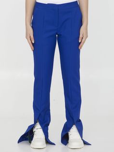 Blue tech drill tailoring pants. It features zip, button and hook-and-eye closure, two side welt pockets, two rear welt pockets and slits at ankles. Slim fit. The model is 178cm tall and wears size IT 42.  Size nationality: IT  Product number: 9996059  Product code: OWCA136F23FAB0014545  Composition: 100% polyester Modern Blue Pants With Belt Loops, Modern Blue Pants With Straight Hem, Modern Blue Tapered Leg Pants, Platform Wedge Heels, Loafer Sneakers, Dress Pant, Premium Brands, Dress With Cardigan, Pump Sandals