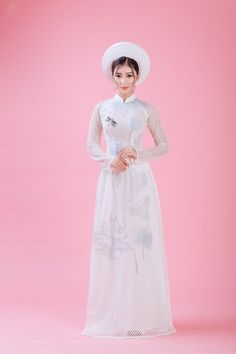 Ao Dai is the traditional costume of Vietnamese women, sewn with silk fabric that is soft, comfortable, airy and elastic, helping to express the gentle beauty and soft curves of the body. This is a special Ao Dai in our collection of wedding dresses, making you stand out but very gentle and polite This Ao Dai has been designed to be more modern and youthful, with many patterns suitable for all ages. Our high-quality, detailed outfits help you stand out in events, interesting in photos of family, Vietnamese Ao Dai Wedding, Detailed Outfits, Vietnamese Wedding Dress, Vietnamese Ao Dai, Vietnamese Wedding, Ao Dai Vietnam, Traditional Costume, Chiffon Fabric, Dress Clothes For Women