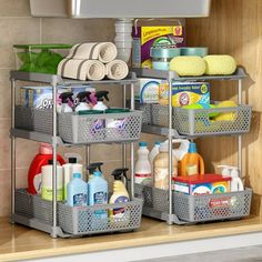 a kitchen shelf filled with lots of cleaning products