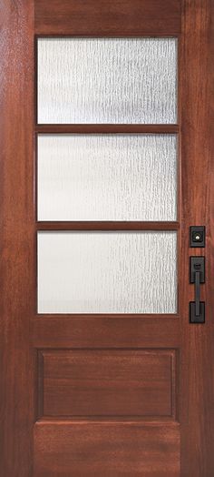 a wooden door with glass panels on the side