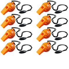 eight orange plastic basketball referee whistles with black handles