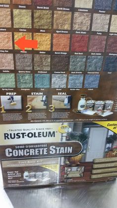 an advertisement for rust - oleum concrete stain is displayed in front of the store's display