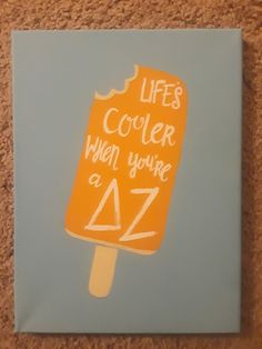 an orange and white ice cream sticker with the words life's cooler when you're 47