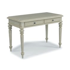 Find French farm-house charm in this Provence Desk by homestyles. Crafted of hardwood solids and mahogany veneers with engineered wood. A hand-applied, aged, off-white painted parchment finish and plank top add character. Features carved turned legs and finished on all four sides, so it can be used in the center of a room. Two lap storage drawers with raised-panel fronts and aged nickel-finished drawer pulls. Arrives at your door by parcel delivery service. Finish and measurements may vary. Asse Cottage Desk, White Wood Desk, Accent Furniture Living Room, Wood Office Desk, Farmhouse Desk, Writing Desk Modern, Modern Computer Desk, Rustic Desk, Off White Paints