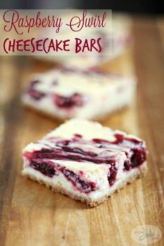 raspberry swirl cheesecake bars on a wooden cutting board with the title above it