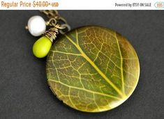 EASTER SALE Green Leaf Locket Necklace. Leaf Necklace with Chartreuse Green Teardrop and Fresh Water Pearl Charm. Bronze Locket. Handmade Ne by TheTeardropShop from The Teardrop Shop. Find it now at https://ift.tt/3437XeC! Necklace Leaf, Chartreuse Green, Steampunk Accessories, Easter Sale, Fresh Water Pearl, Close Up Pictures