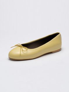 Editor's NotesSEONG YUN JOO presents feminine daily footwear that adds a sophisticated accent to your look. - Long round toes- Ribbon adorned on the upper- Naturally wrinkled fabric- Glossy and soft patent leather- Feminine and casual mood Measurements (in.)- Size: KR 220MM (US 5) ~ KR 265MM (US 9.5)- Heel: 0.31 in.*Fit true to size Composition & Care- Material: Cow Leather- Natural leather may have fine scratches and wrinkles- Bright leather can get stained by denim or d Ballet Flats With Removable Insole For Galas, Slip-on Ballet Flats For Galas, Classic Flats For Galas, Elegant Fitted Ballet Flats With Rubber Sole, Elegant Yellow Slip-on Heels, Yellow Flats With Removable Insole, Fitted Heels With Rubber Sole, Yellow Almond Toe Flats With Rubber Sole, Wrinkled Fabric