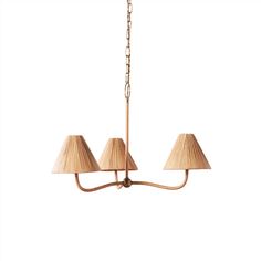 three light chandelier with beige shades on the bottom and two lamps hanging from it