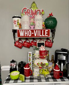 there is a sign that says grinch, who - vile and other items on the shelf