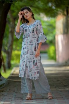 Quality: 100 % Guaranteed Stitched: Yes Full Stitched Sleeve length: 3/4 sleeve Pockets: No Leg/hem length: Mid-calf Neckline: Boat Kurta style: Straight Fabric technique:  Embroidered Wash Care: Machine Wash & Hand Wash In Cold Water Using Mild Detergent. Shipping - We use globally known Logistics for best services like Fed-Ex, DHL, India Post. It usually takes around 7 - 15 day to deliver in Standard Delivery OR 3 - 7 Day in Express. Return - We gladly accept return in light of Etsy Guidelines. Please contact us before raising a Return Request, we may be more useful in resolving your issues. Fitted Cotton Kurta With 3/4 Sleeves, Cotton Kurta With 3/4 Sleeves For Spring, Casual Cotton Kurta With Half Sleeves, Spring Cotton Sets With 3/4 Sleeve, Bohemian Cotton Kurta With 3/4 Sleeves, Bohemian Kurta With 3/4 Sleeves For Spring, Spring Bohemian Kurta With 3/4 Sleeves, Bohemian 3/4 Sleeve Kurta For Spring, Cotton Folk Style Kurta For Spring