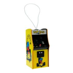 an old fashioned arcade machine with a cartoon character on it's front and sides